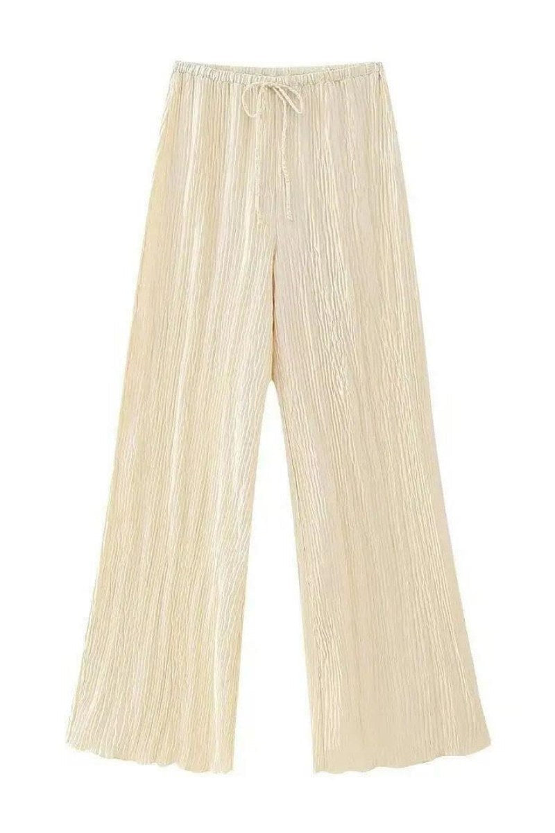 Mouwloos haltertopje met hoge taille, casual broek met wijde pijpen