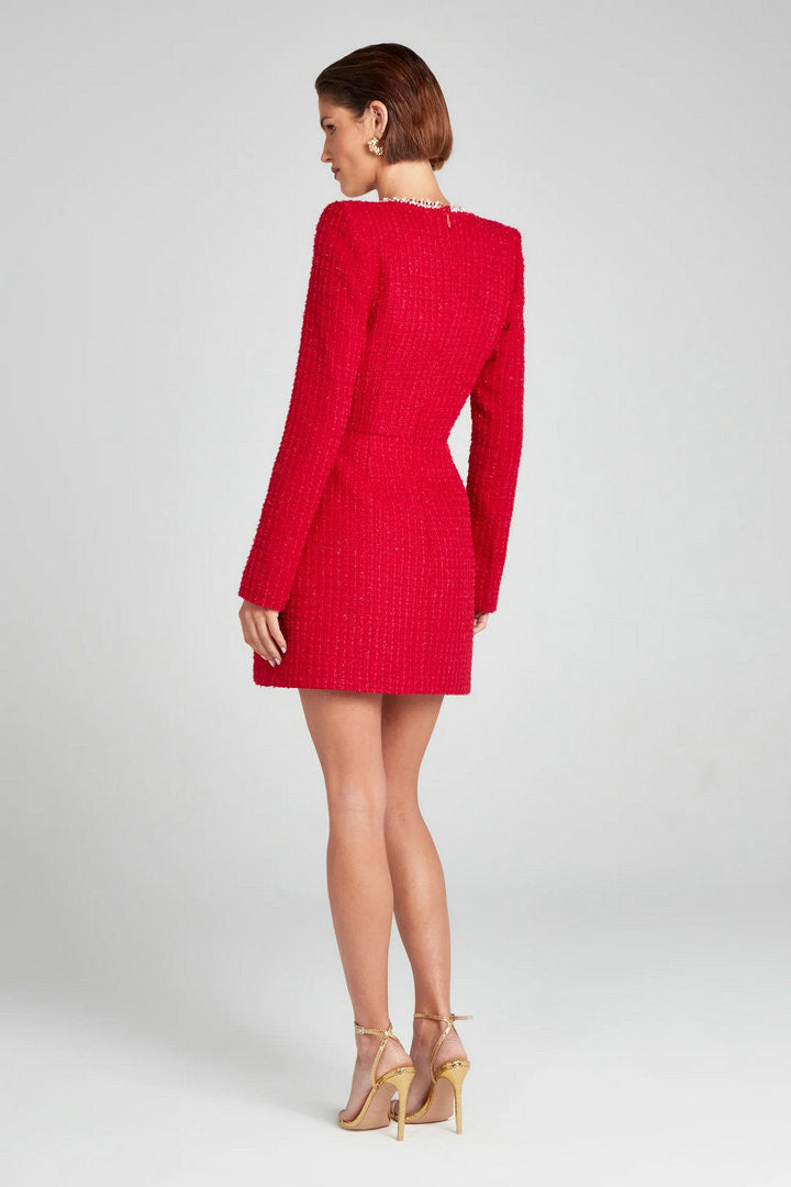 Mini-jurk met pareltjes en zakje