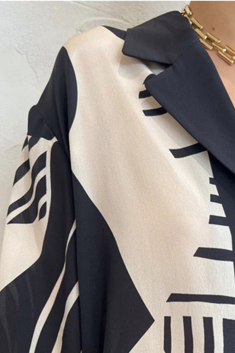 Trendy broekenset met losse wijde pijpen en graffitiprint