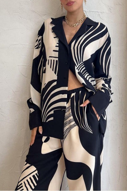 Trendy broekenset met losse wijde pijpen en graffitiprint