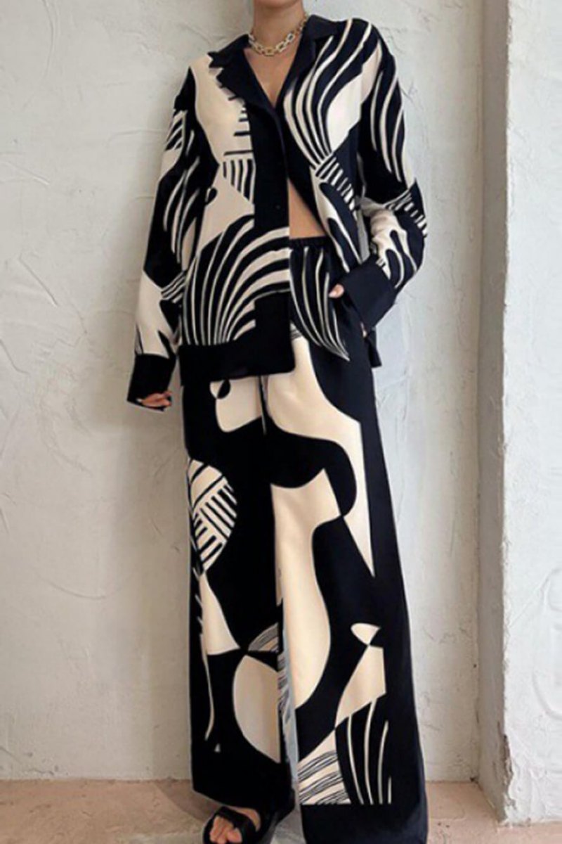 Trendy broekenset met losse wijde pijpen en graffitiprint