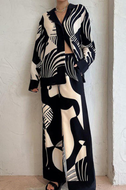 Trendy broekenset met losse wijde pijpen en graffitiprint