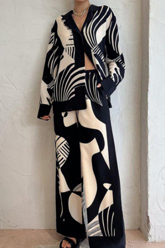 Trendy broekenset met losse wijde pijpen en graffitiprint