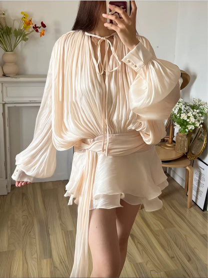 Eugénie fully-pleated ruffled mini dress in Neutrals
